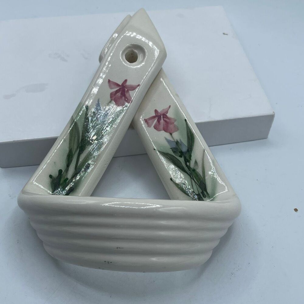 Art Pottery pink Iris towel holder.